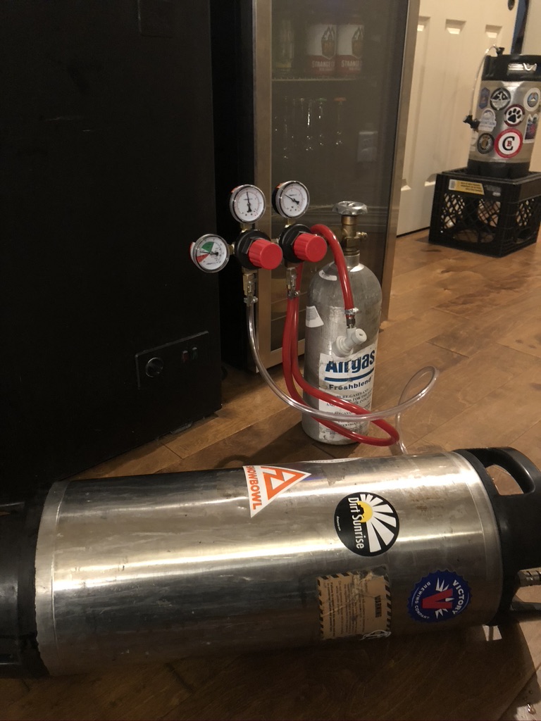 Burst carbonating while rocking beer back and forth