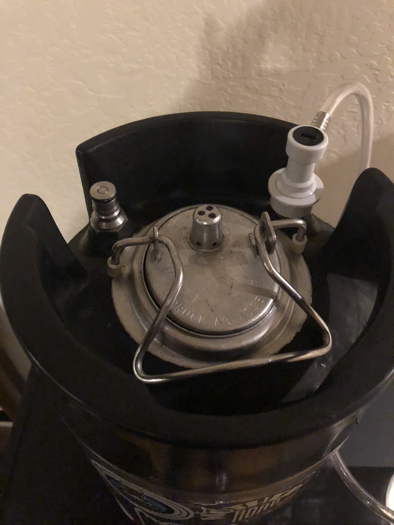 Quick disconnect attached to gas-side of keg